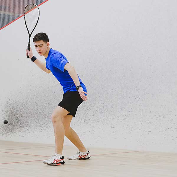 Squash player forehand in Burton on Trent